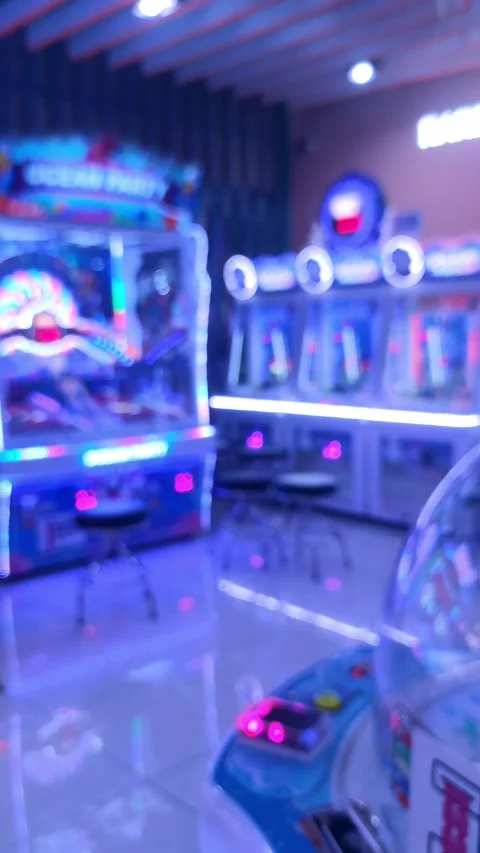 Blurred Defocused Arcade Game Center with Colorful Neon Lights 库存影片 341329287
