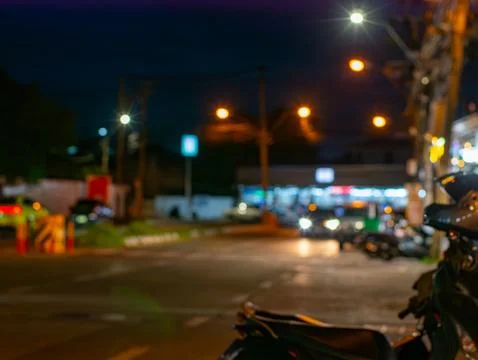 Blurred defocused bokeh abstract background of busy Bangkok night street wi.. Stockfoto's