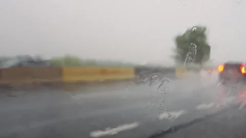 Blurred defocused extreme wind and rain during daytime. Stock Footage 295774536
