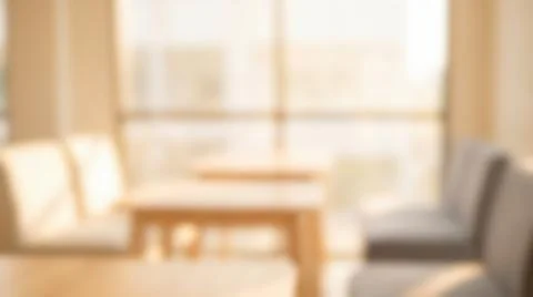 Blurred defocussed background of warm cozy restaurant cafe interior dining ro Stock Photos