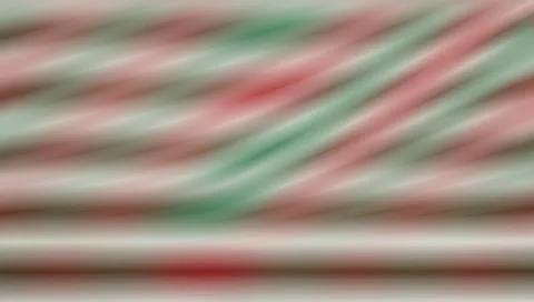 Blurred diagonal stripes in red green and white colors Иллюстрация