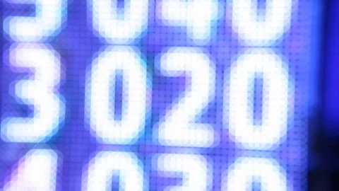 Blurred digital numbers scrolling digitally on an LED panel with blue and black 動画素材 110764368