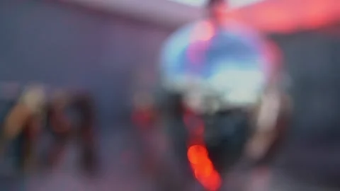 A Blurred Disco Scene Featuring Colorful Lights and Their Captivating Reflection Stock Footage 291006145