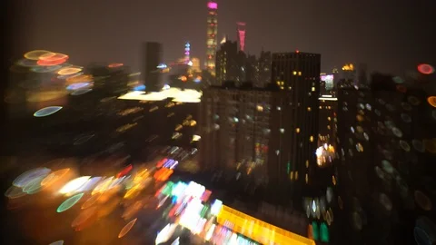Blurred dramatic night view of Shanghai  city with  beautiful bokeh,shot by tilt Stock Footage 91082754