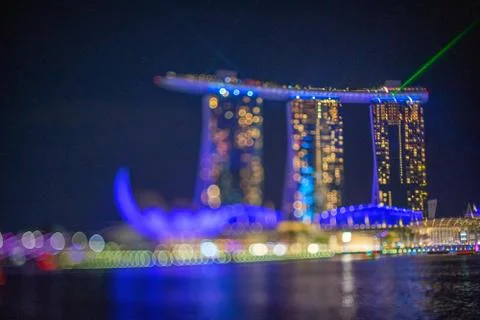 Blurred dramatic night view of Singapore city with abstract of LED, neon ligh Stock Photos