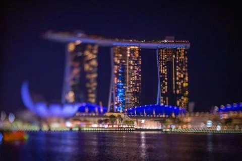 Blurred dramatic night view of Singapore city with abstract of LED, neon ligh Stock Photos