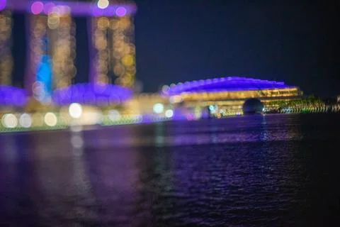 Blurred dramatic night view of Singapore city with abstract of LED, neon ligh Stock Photos