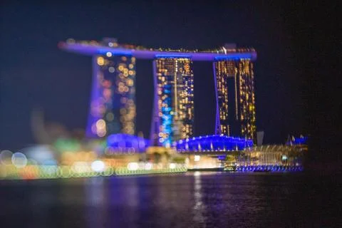 Blurred dramatic night view of Singapore city with abstract of LED, neon ligh Stock Photos