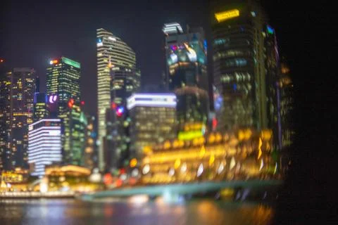 Blurred dramatic night view of Singapore city with abstract of LED, neon ligh Stock Photos