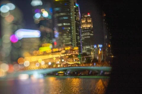 Blurred dramatic night view of Singapore city with abstract of LED, neon ligh Stock Photos