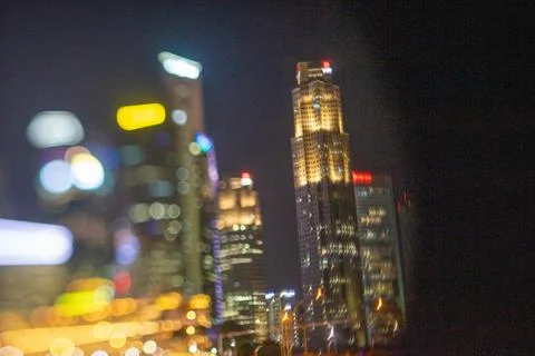 Blurred dramatic night view of Singapore city with abstract of LED, neon ligh Stock Photos