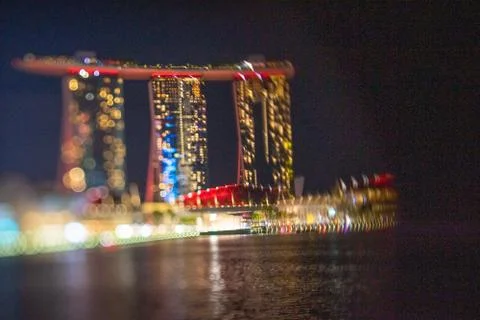 Blurred dramatic night view of Singapore city with abstract of LED, neon ligh Stock Photos