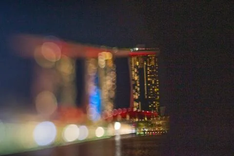 Blurred dramatic night view of Singapore city with abstract of LED, neon ligh Stock Photos