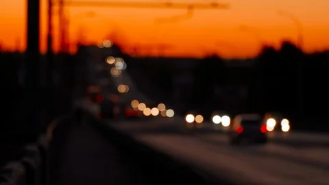 Blurred Dramatic Red Sky Of Sunset And Flow Of Commuters Cars Stock Footage 89485392