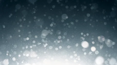 Blurred dust particles floating on grey background with sun flare in slow motion Vidéo 123427012