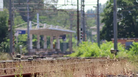 Blurred effect of summer heat on the train station tracks - 4K - ProRes Stock Footage 158171862