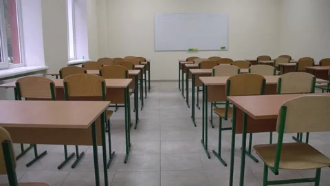 Blurred of Empty Classroom in lecture room or School with desks chair wood for Video stock 165056231
