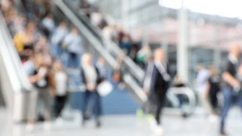 Blurred escalators in convention hall used by crowd of people Video stock 120401719