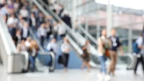 Blurred escalators used by crowd of people during conference Stock Footage 123281108