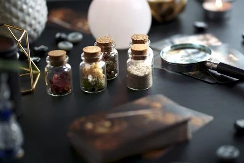 Blurred esoteric magic objects tarot cards on witch table altar Stock Photos