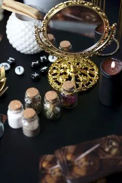 Blurred esoteric magic objects tarot cards on witch table altar Stock Photos