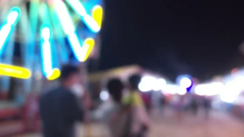Blurred ferris wheel night scene Stock Footage 78937385