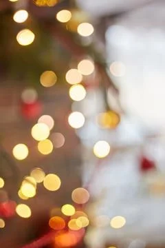 Blurred festive background pattern. Christmas tree bokeh. Blur effect Stock Photos