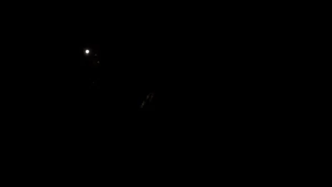 Blurred fireworks explosions on dark background. New Year's Eve celebrations Stock Footage 123778334