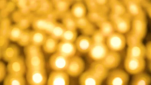 Blurred Floating Lamp bokeh background. Glittering golden light spots, Stock Footage 195328540