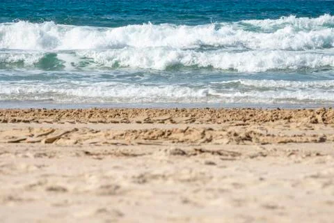 Blurred the front background of the warm seaside on a sunny day Stock Photos