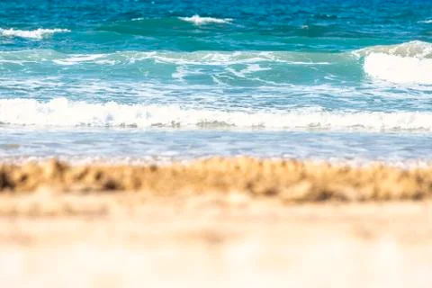 Blurred the front background of the warm seaside on a sunny day Stock Photos