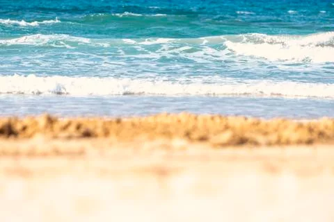 Blurred the front background of the warm seaside on a sunny day Stock Photos