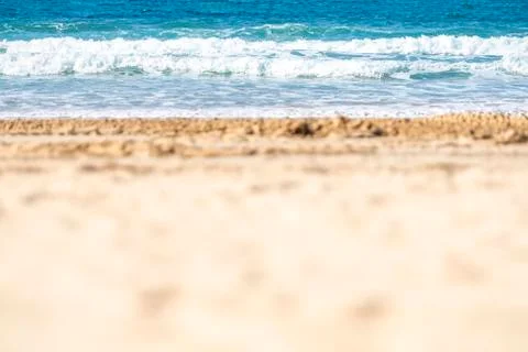 Blurred the front background of the warm seaside on a sunny day Stock Photos