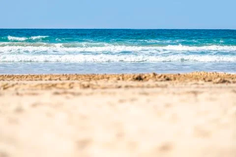 Blurred the front background of the warm seaside on a sunny day Stock Photos