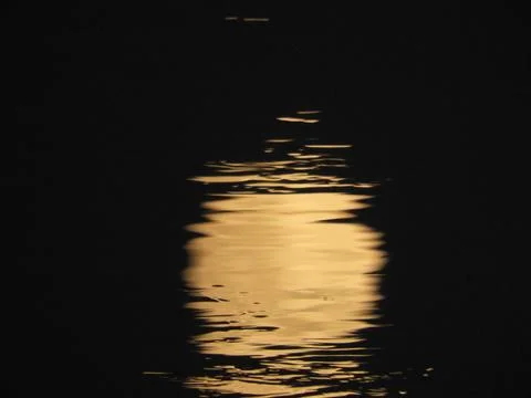 Blurred Full Moon Reflection On Water Surface Stock Photos