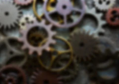 Blurred gears and components background Stock Photos