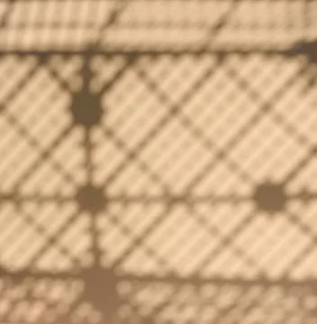 Blurred geometric pattern in beige and brown tones. Stock Photos