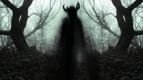 A  blurred ghostly figure appearing on a path, like a pagan spirit Stock Photos