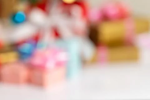 Blurred gift on the white table use for backgrounds Stock Photos