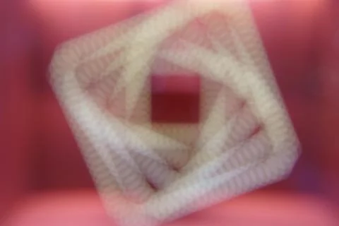 Blurred glowing white square on a red background. Illustrazione stock
