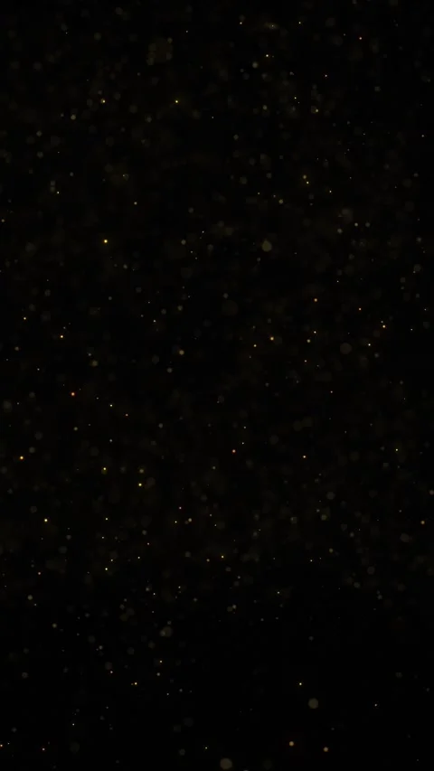 Blurred gold dots random loop slow flying vertical animation Stockbeeldmateriaal 346393200