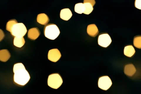 Blurred golden lights Stock Photos