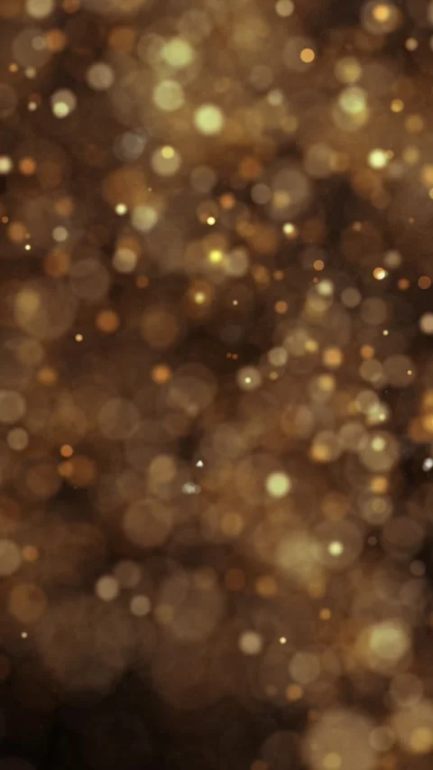 Blurred golden particles loop movement on vertical background Video stock 346392974