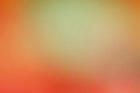Blurred gradient background with a blend of coral, beige and pistachio colo.. Stock Photos