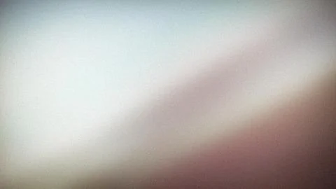 Blurred gradient background with grainy texture in muted purple beige and l.. Stock Photos