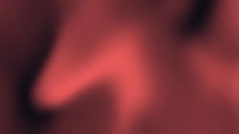 Blurred gradient background shades red and dark brown.  Vidéo 287332102