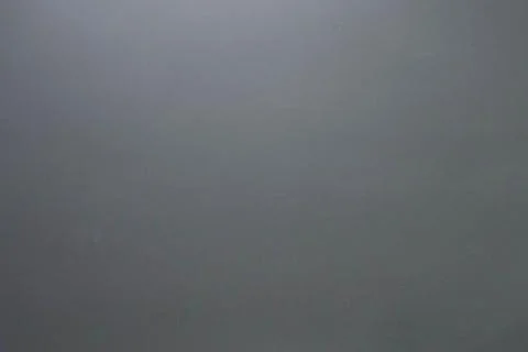 Blurred Gray Background abstract light gradient close-up. Stock Photos
