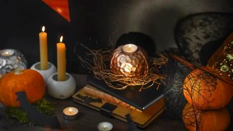 Blurred Helloween composition with pumpkins and candles Stock Photos