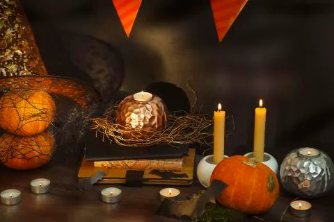 Blurred Helloween composition with pumpkins and candles Stock Photos