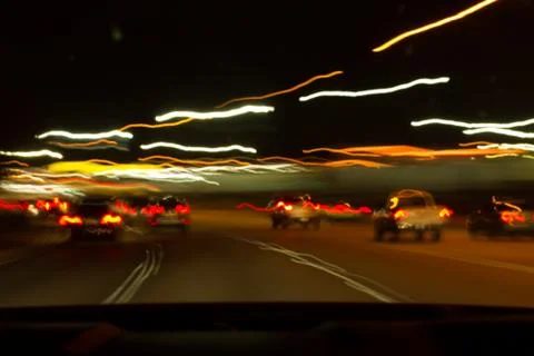 Blurred highway driving Stock Photos